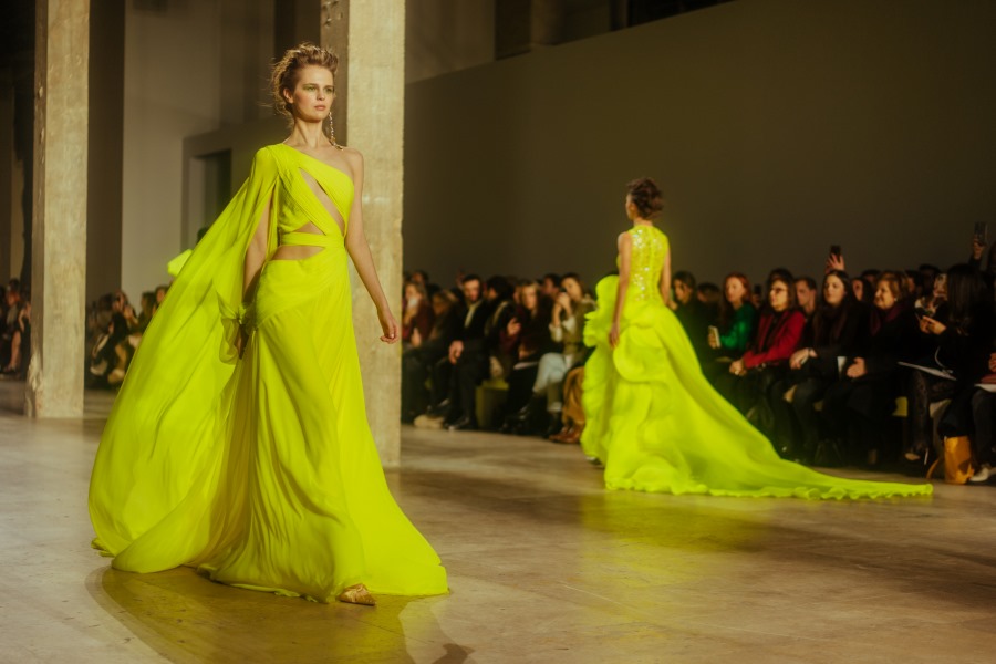 Bright green couture dress collection. Image 3