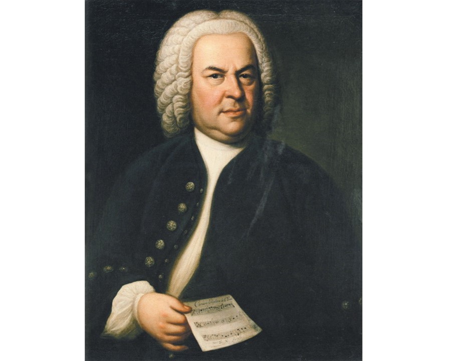 Johann Sebastian Bach (aged 61) in a portrait by Elias Gottlob Haussmann , second version of his 1746 canvas